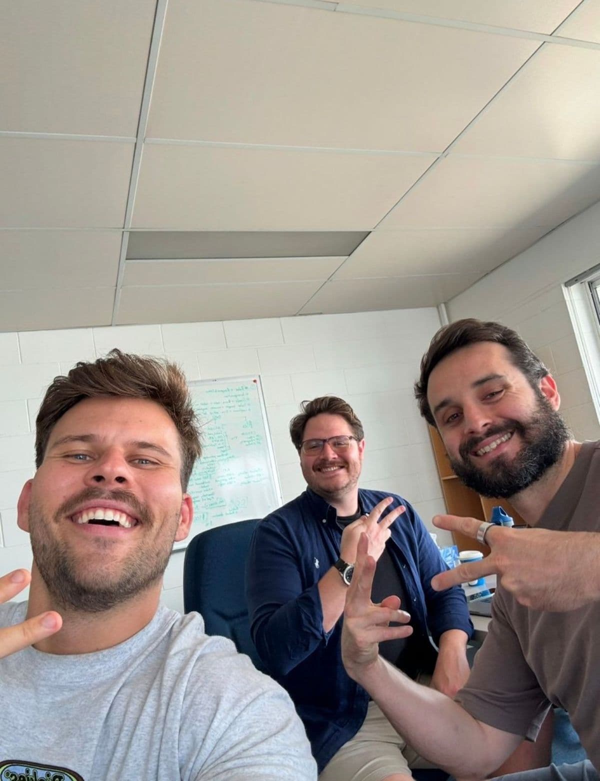 The three MapTrack co-founders in the office