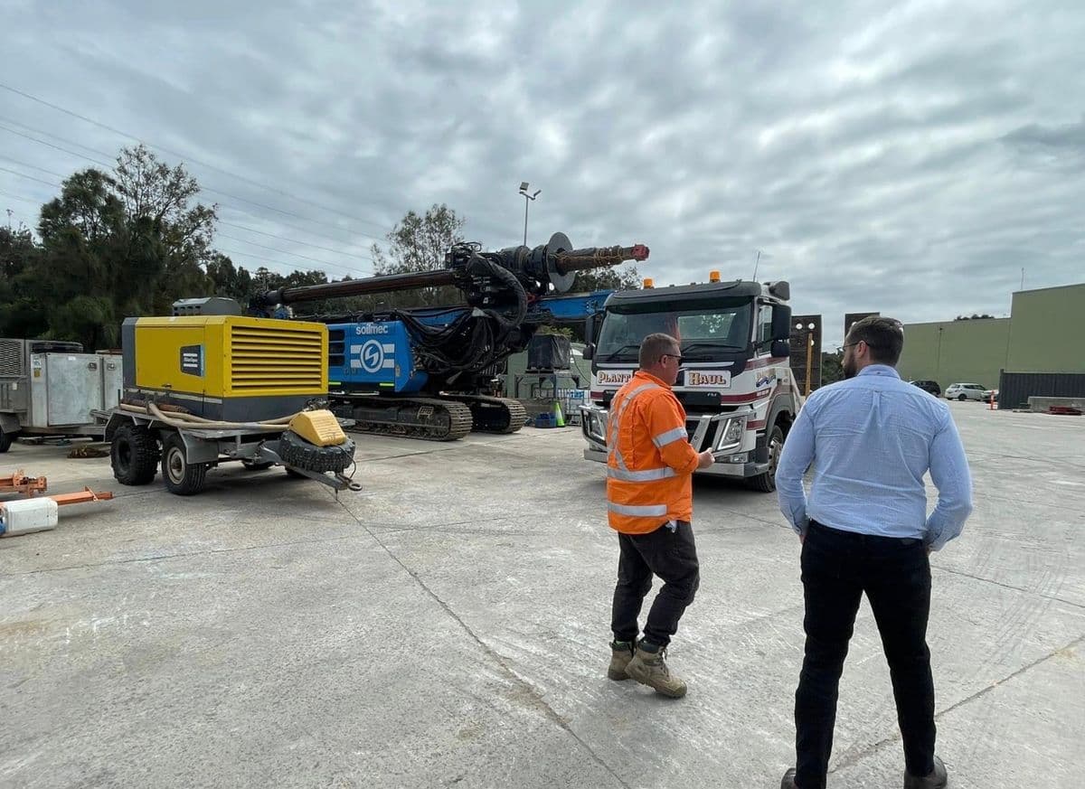 MapTrack team inspecting a Soilmec drilling rig onsite