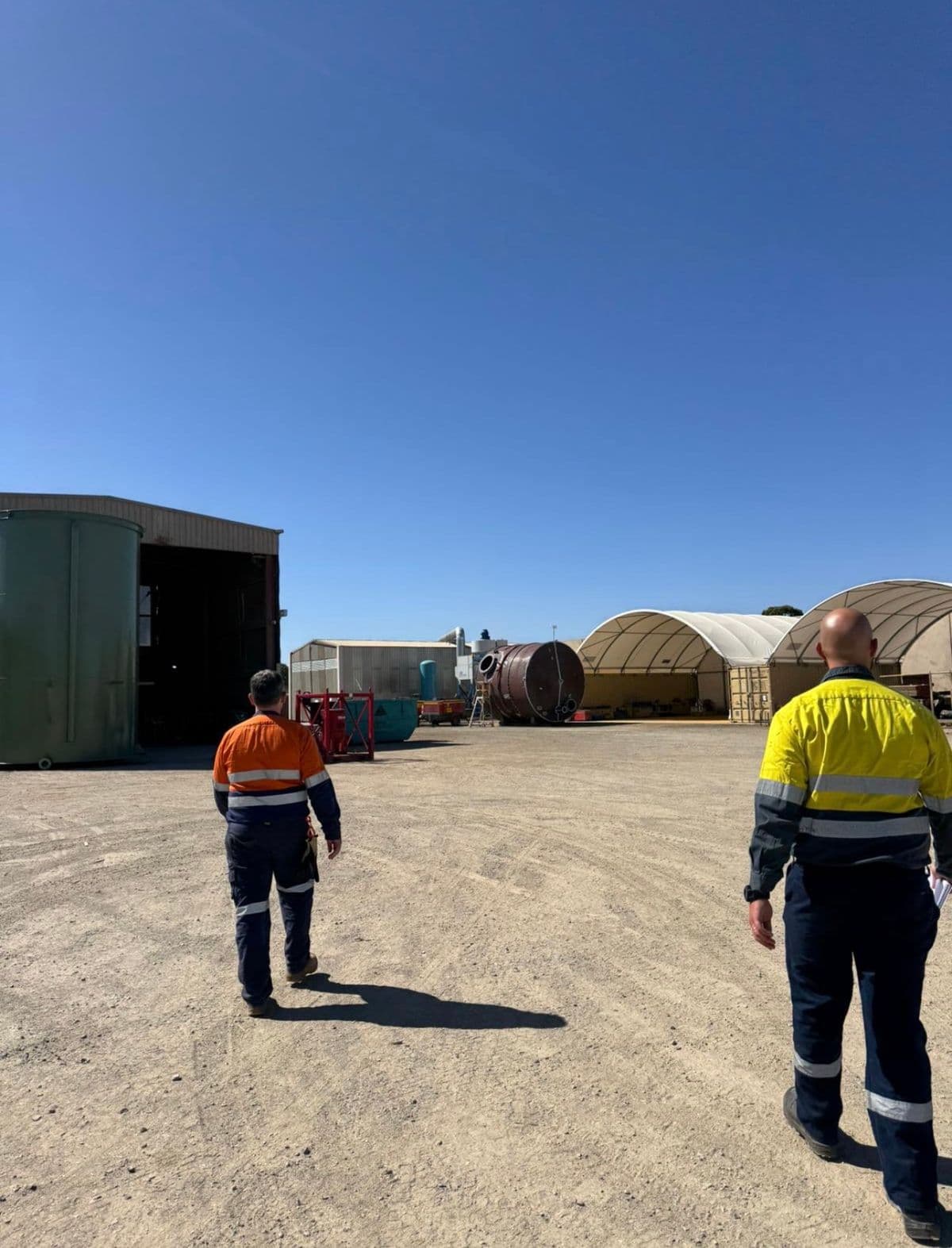 Site walk at an industrial fabrication yard