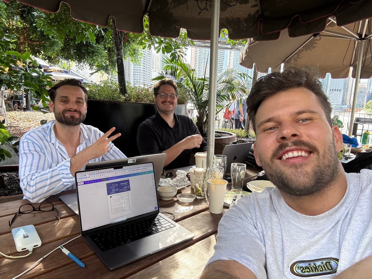 MapTrack founders working from a cafe